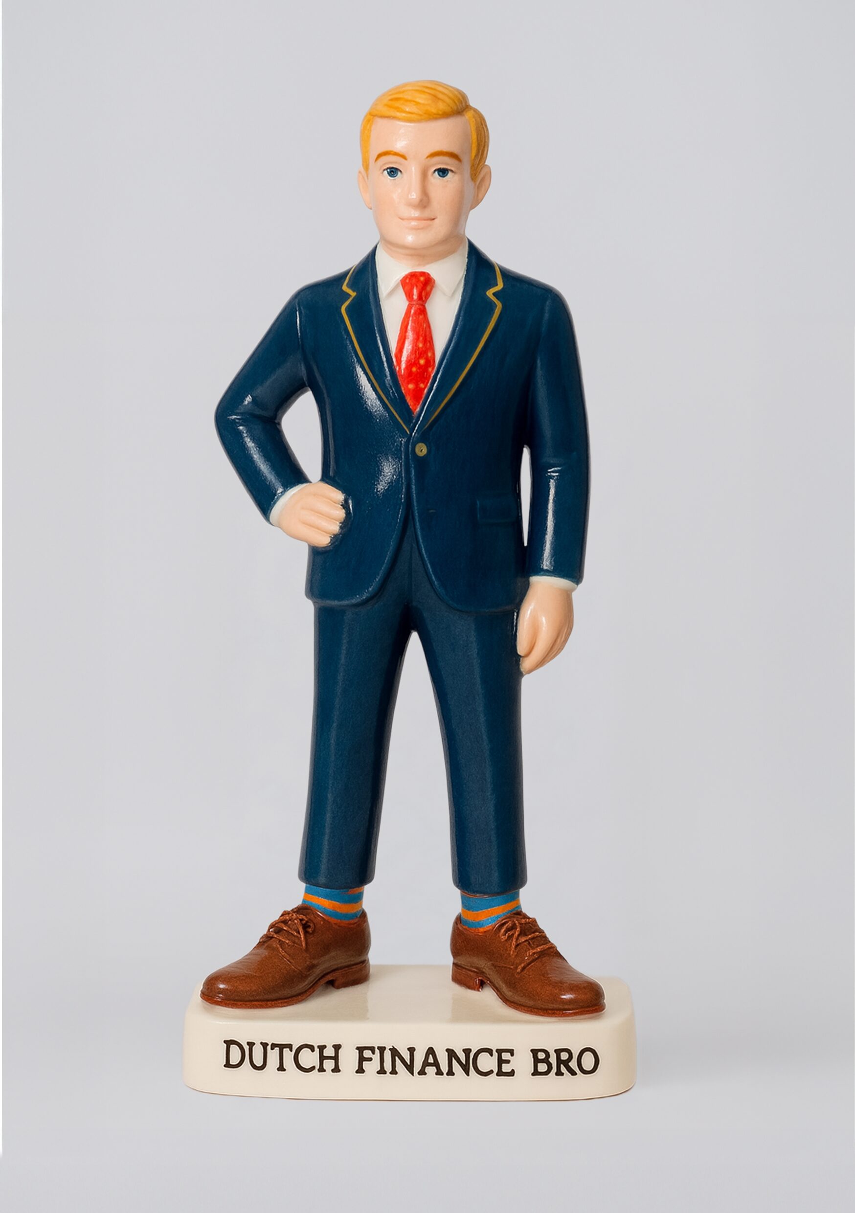 The Dutch finance bro: sharp suit, shiny shoes, and always that one sock with a flamingo on it - pure rebellion.